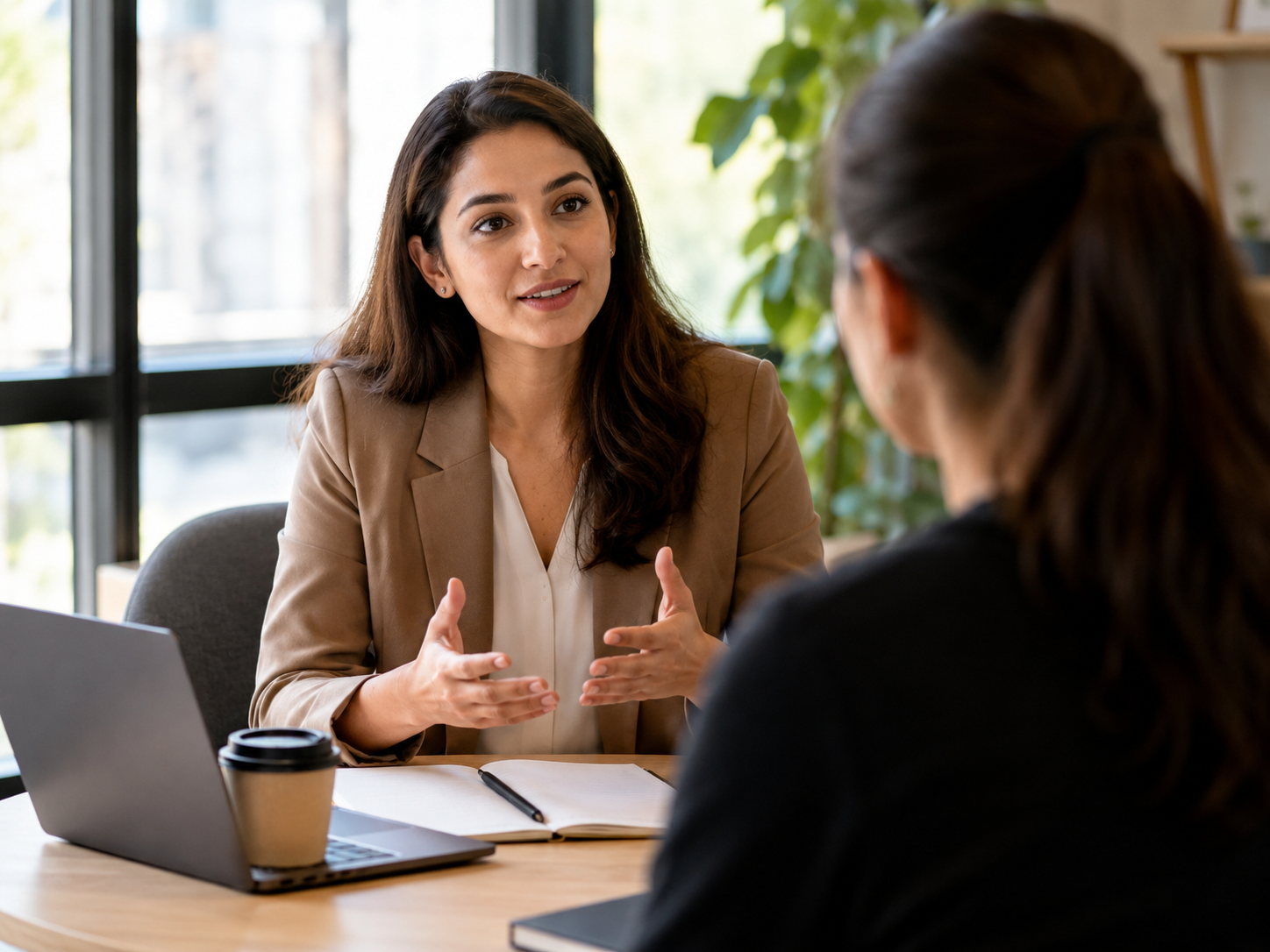 Career coach guiding a candidate during a one-on-one interview prep session